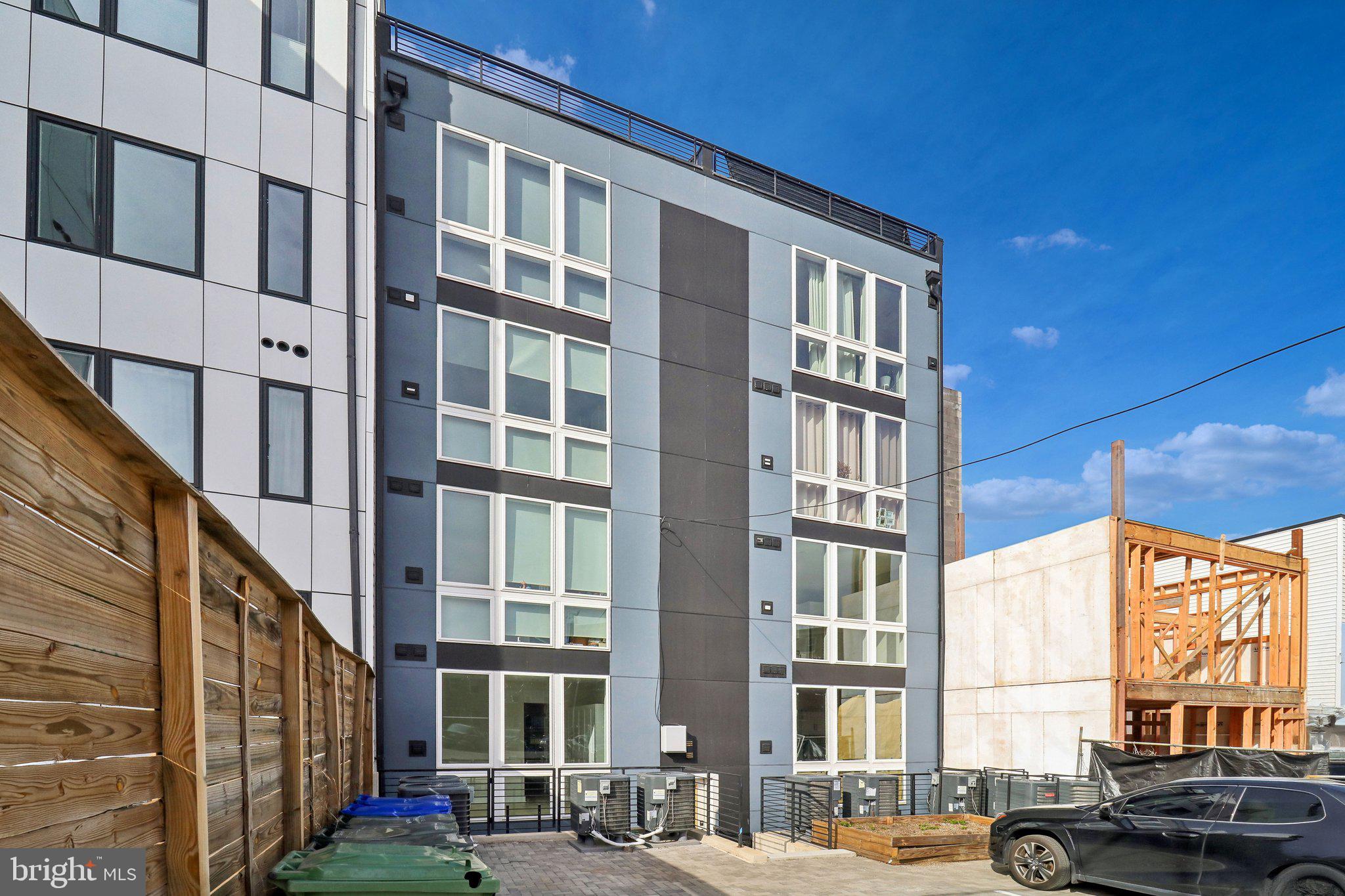 2213 M Street Northeast, Unit 4 Washington, DC 20002 - Photo 38 of 39 a front view of a building with a street