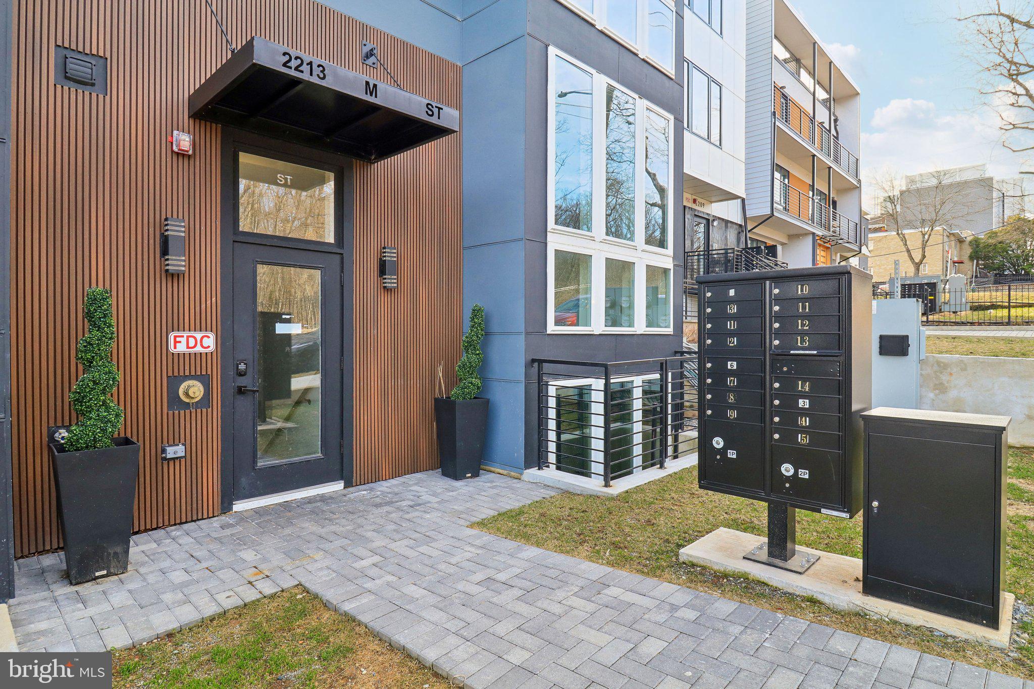 2213 M Street Northeast, Unit 4 Washington, DC 20002 - Photo 6 of 39 a view of a house with a backyard