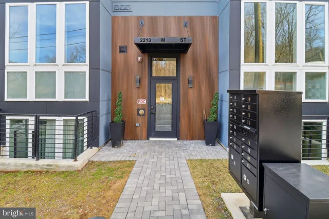 a view of a hallway with stairs