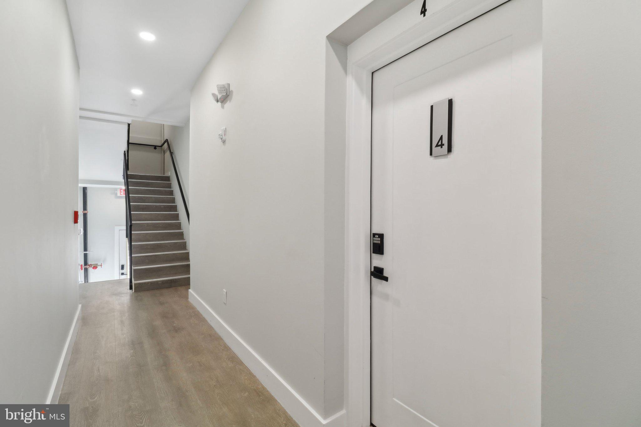 2213 M Street Northeast, Unit 4 Washington, DC 20002 - Photo 8 of 39 a view of a hallway with stairs