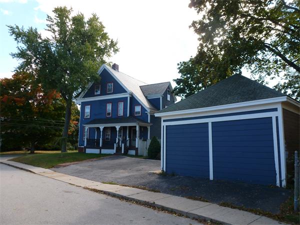 21 Congress Street Amesbury, MA 01913 - Photo 12 of 24 a front view of a house with garden