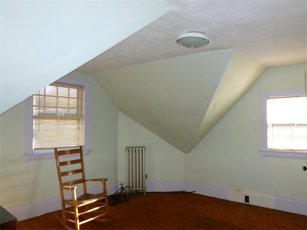 21 Congress Street Amesbury, MA 01913 - Photo 19 of 24 a view of livingroom with hardwood floor and window