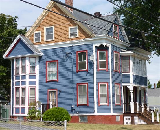21 Congress Street Amesbury, MA 01913 - Photo 2 of 24 a front view of a house with a yard