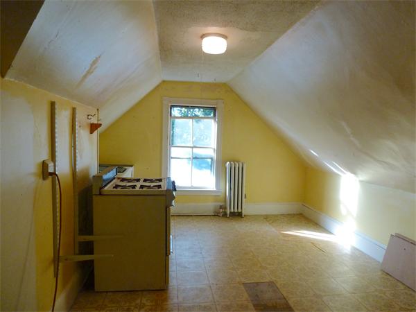 21 Congress Street Amesbury, MA 01913 - Photo 22 of 24 a view of empty room with a fireplace