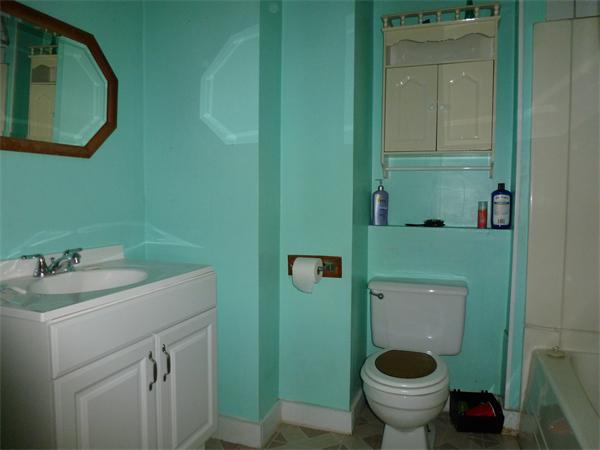 21 Congress Street Amesbury, MA 01913 - Photo 24 of 24 a bathroom with a toilet and a sink
