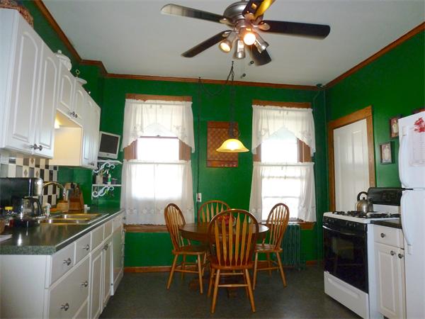21 Congress Street Amesbury, MA 01913 - Photo 3 of 24 a view of a dining room with furniture window and outside view