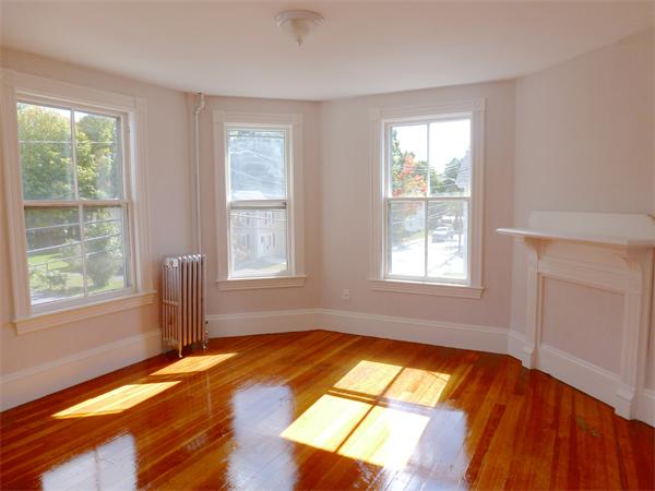 21 Congress Street Amesbury, MA 01913 - Photo 9 of 24 a view of an empty room with window