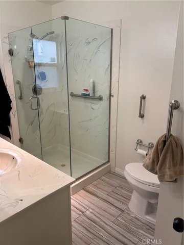 a bathroom with a sink and toilet
