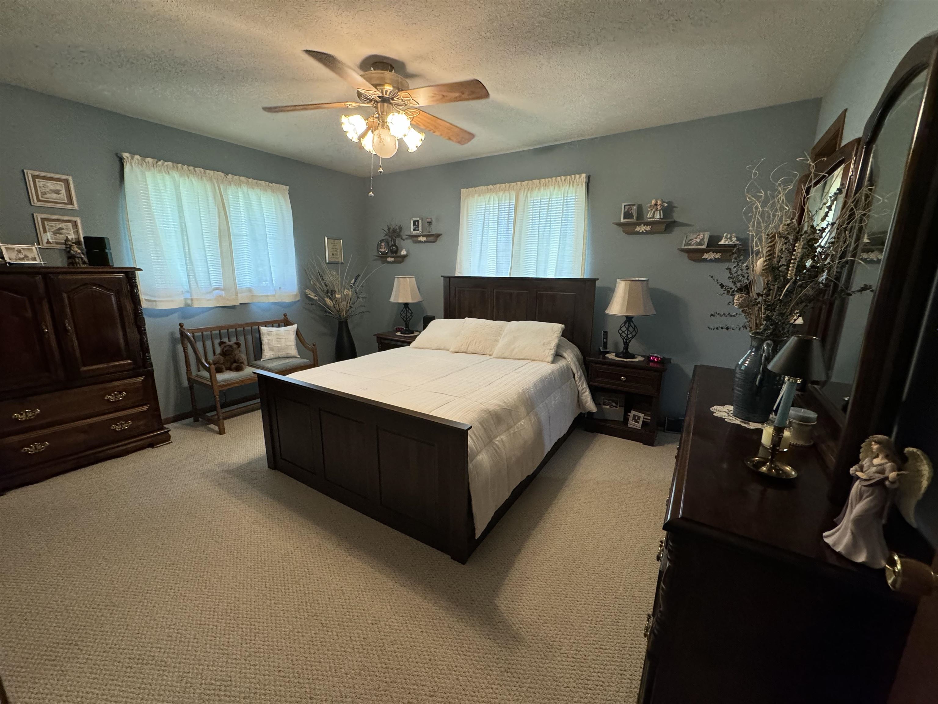 12255 Rae Ann Road Roscoe, IL 61073 - Photo 19 of 37 a bed room with a bed window and a dresser