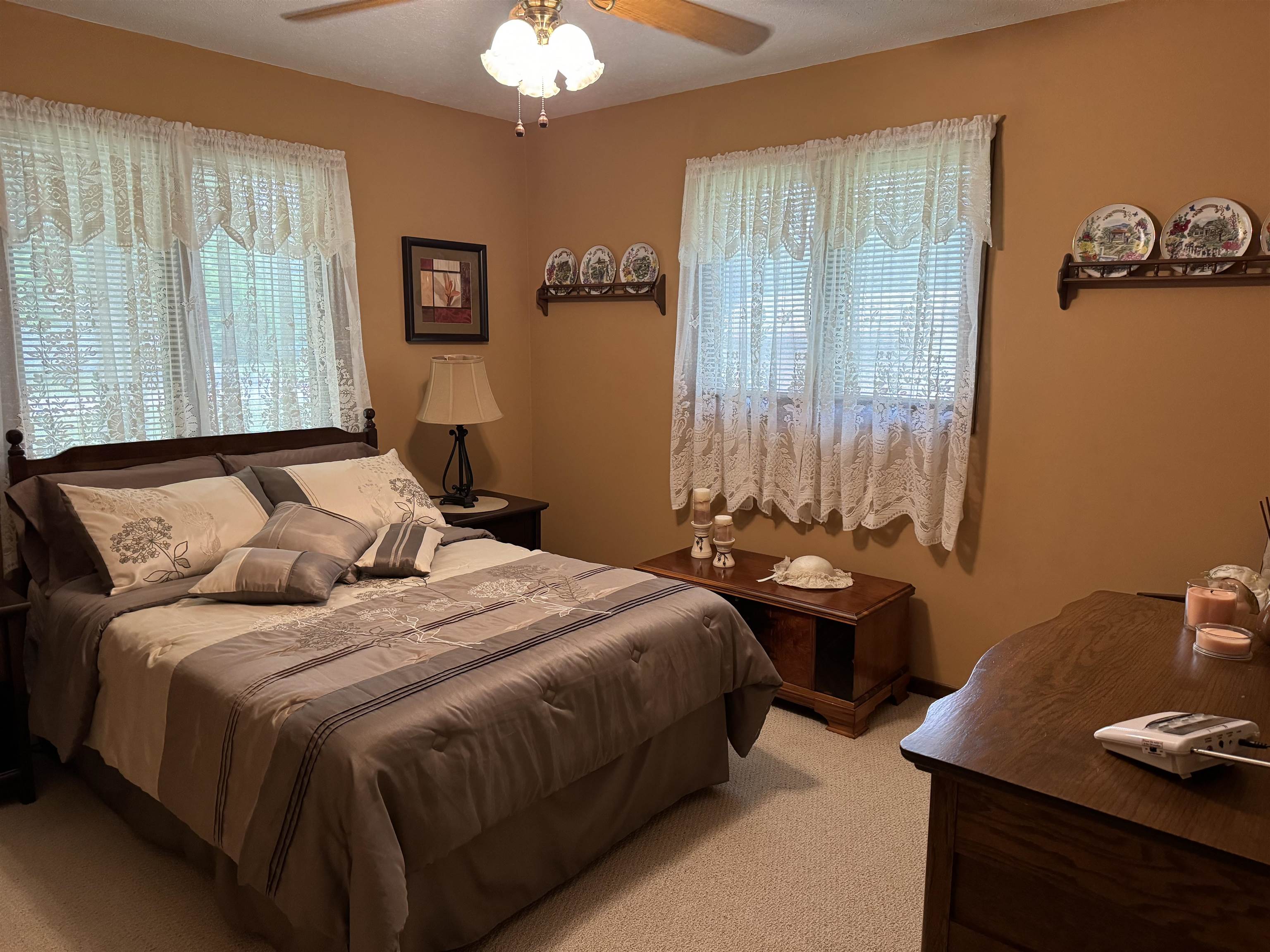 12255 Rae Ann Road Roscoe, IL 61073 - Photo 24 of 37 a bedroom with a bed and a table