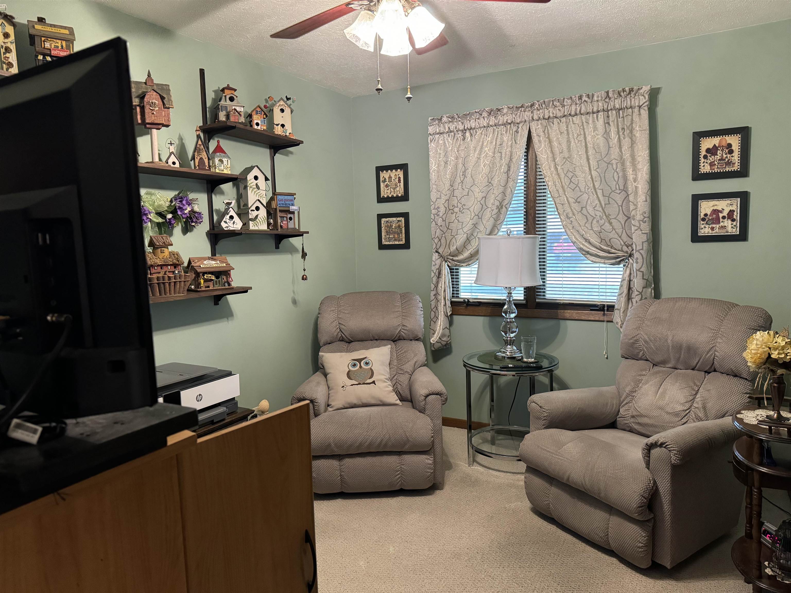 12255 Rae Ann Road Roscoe, IL 61073 - Photo 25 of 37 a living room with furniture and a window