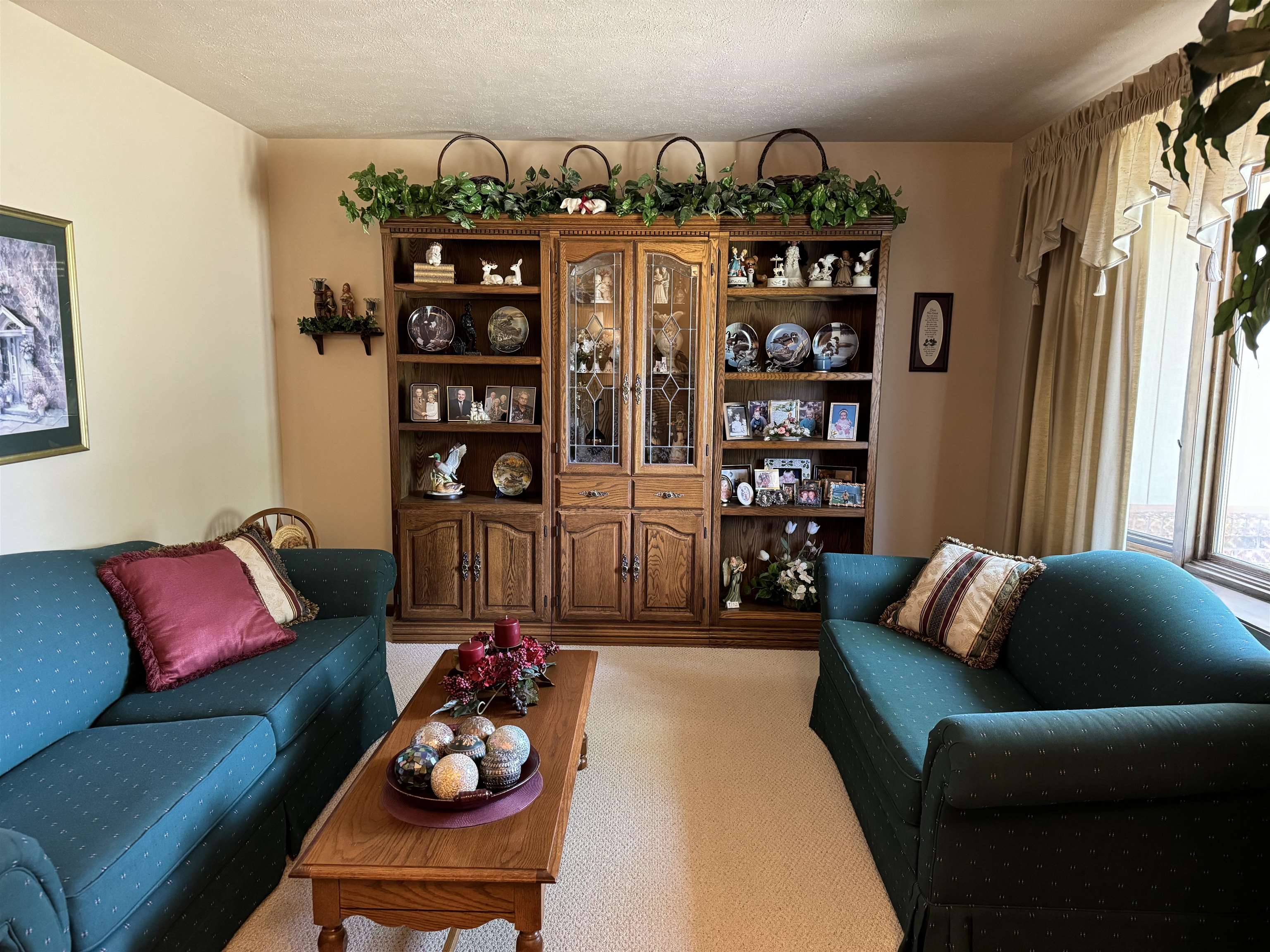 12255 Rae Ann Road Roscoe, IL 61073 - Photo 5 of 37 a living room with furniture cabinets and window