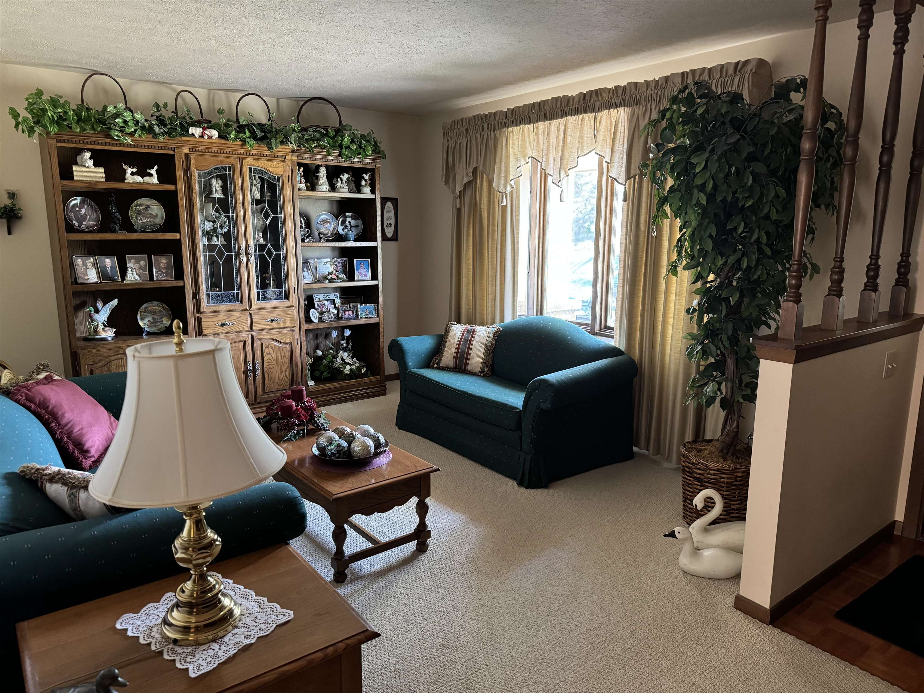 12255 Rae Ann Road Roscoe, IL 61073 - Photo 6 of 37 a living room with furniture a rug and a window
