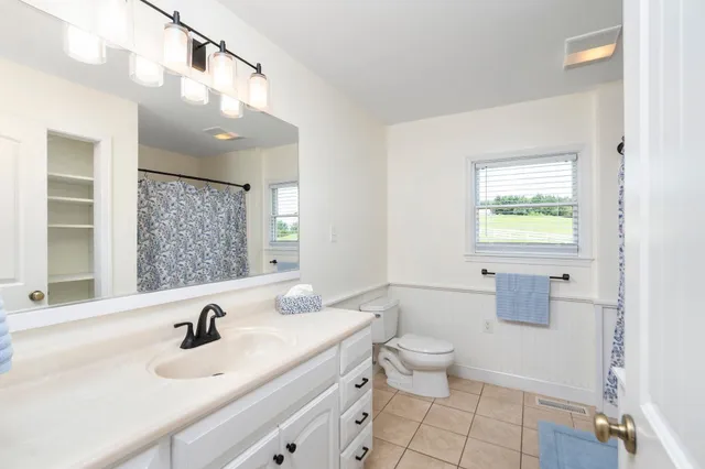 a view of a lake with a yard