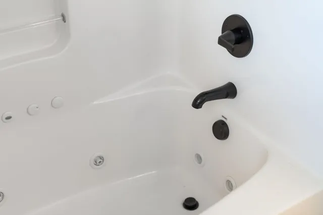 an aerial view of a house with yard swimming pool and outdoor seating