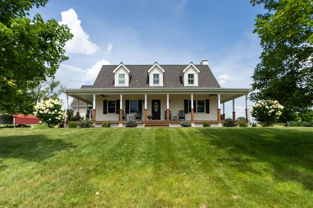 a view of a building with a yard