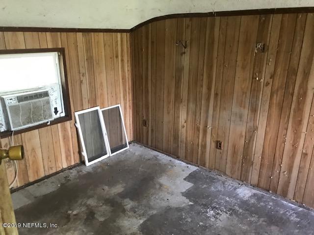 5205 Hancock Road Jacksonville, FL 32254 - Photo 14 of 25 a view of a wooden door