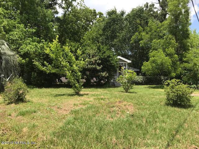 5205 Hancock Road Jacksonville, FL 32254 - Photo 24 of 25 a backyard of a house with lots of green space and garden