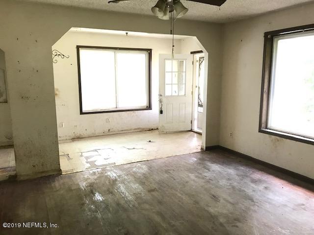 5205 Hancock Road Jacksonville, FL 32254 - Photo 10 of 25 an empty room with windows