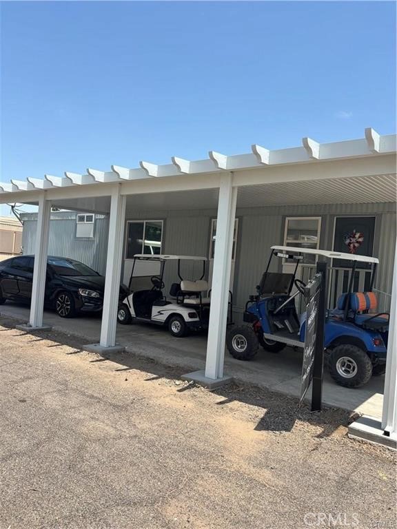 670 Channel Way Needles, CA 92363 - Photo 19 of 19 a view of parking garage with cars