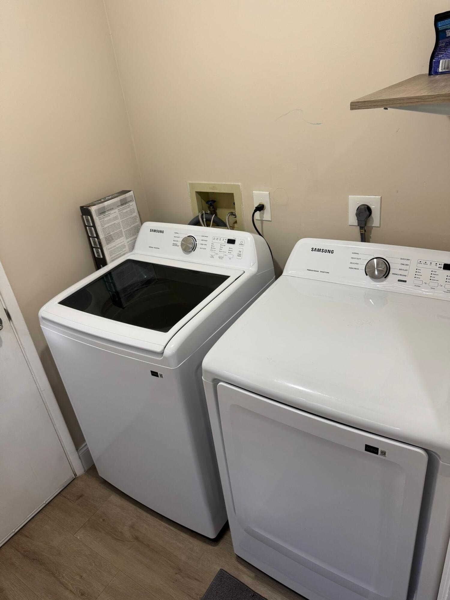 18560 Sunburst Lane, Unit D Boca Raton, FL 33496 - Photo 16 of 28 a utility room with dryer and washer