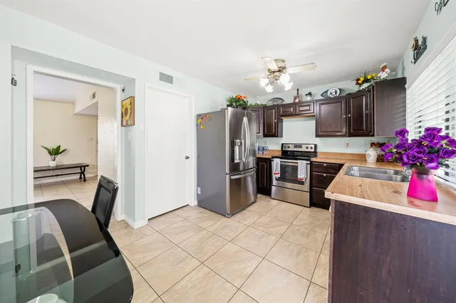 a kitchen with granite countertop lots of counter top space