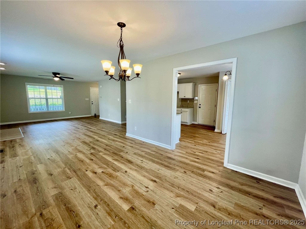 216 Cobblestone Drive Spring Lake, NC 28390 - Photo 21 of 30 a view of a room with wooden floor