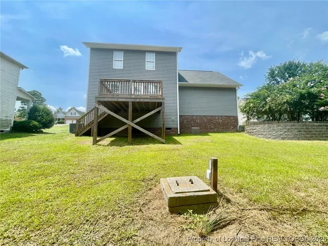 a front view of a house with yard