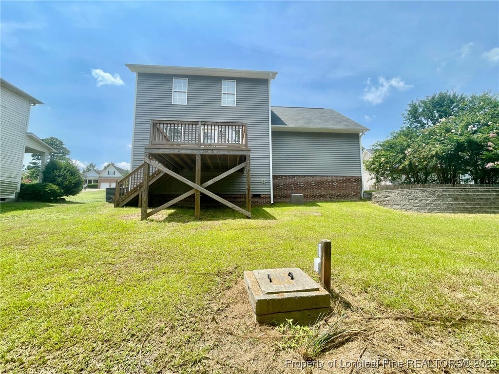 216 Cobblestone Drive Spring Lake, NC 28390 - Photo 27 of 30 a front view of a house with yard