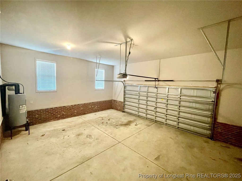 216 Cobblestone Drive Spring Lake, NC 28390 - Photo 3 of 30 a view of a room with racks on the wall