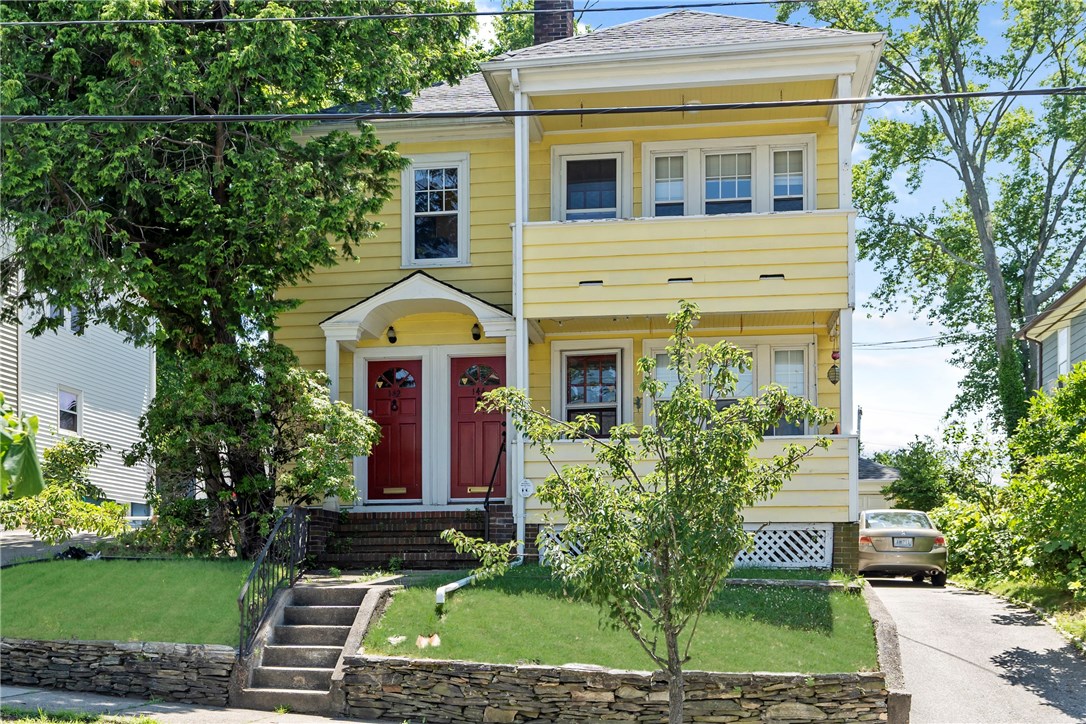     CHARMING TWO FAMILY NEAR HOPE VILLAGE WITH A TWO CAR GARAGE.  MANY IMPROVEMENTS ALSO !!