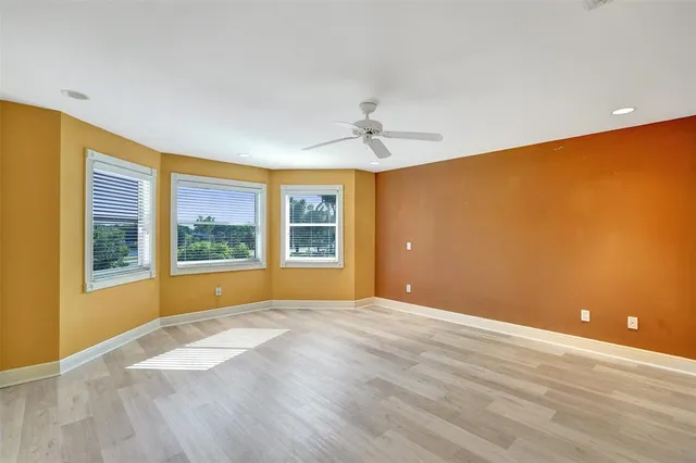 a bathroom with a double vanity sink mirror and shower