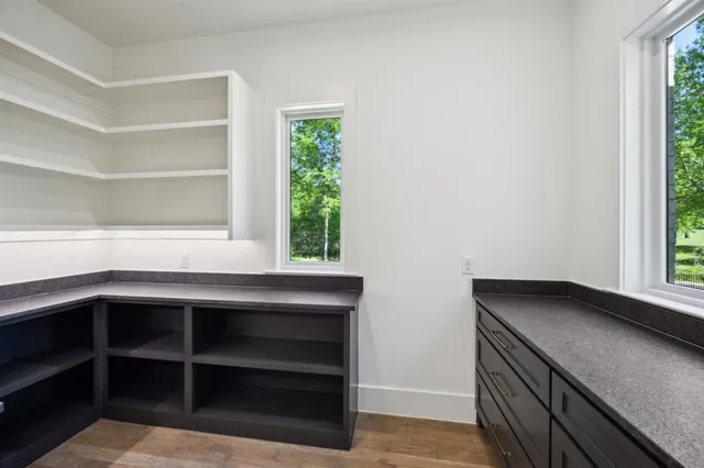a kitchen with a sink and a window