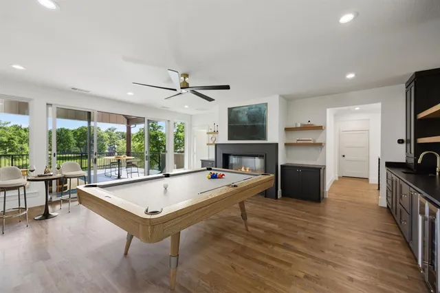 a building outdoor space with patio couches and potted plants