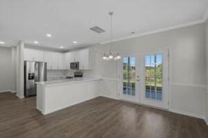 746 Alma Square Drive Moncks Corner, SC 29461 - Photo 2 of 11 Palmer family room and kitchen