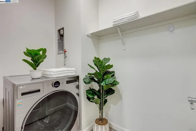 a vase of flowers sitting on a table with six mirrors