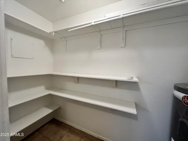 a storage room with cabinets