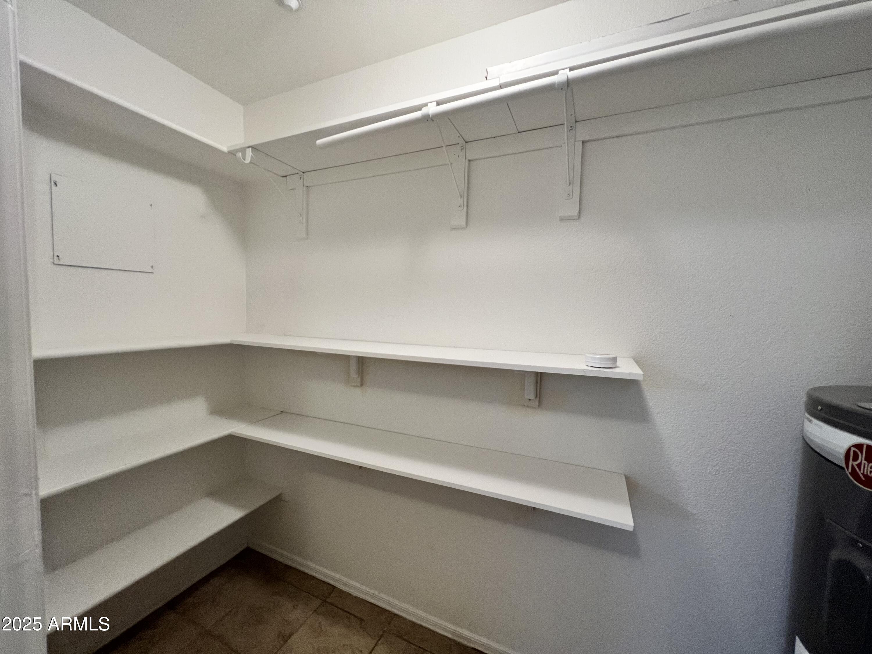 5303 North 7th Street, Unit 132 Phoenix, AZ 85014 - Photo 16 of 32 a storage room with cabinets