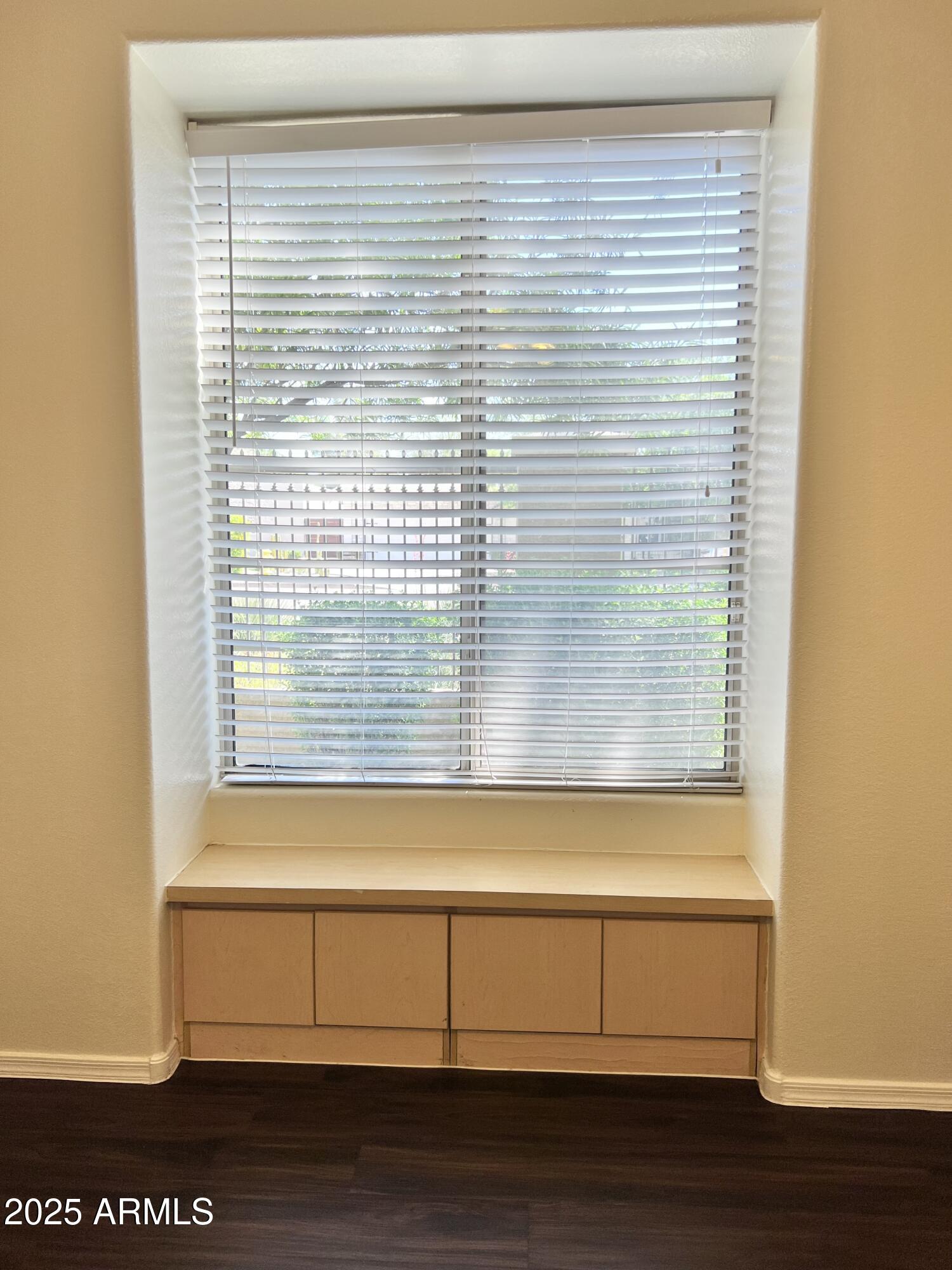 5303 North 7th Street, Unit 132 Phoenix, AZ 85014 - Photo 29 of 32 a view of a small space with wooden floor and a window