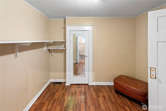 a view of a livingroom with wooden floor