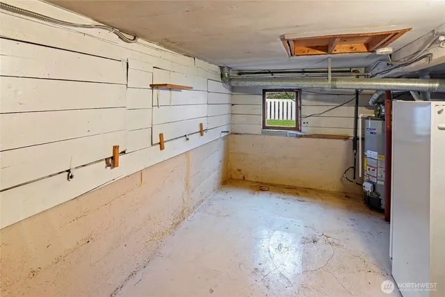 a white toilet sitting next to a bathroom sink