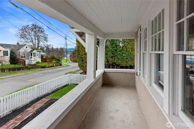 a view of a porch and garden