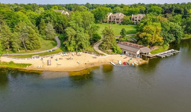a view of a house with a porch and furniture