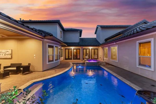 a view of front door with wooden door