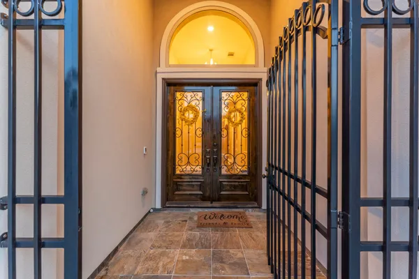 a view of an entryway with wooden floor