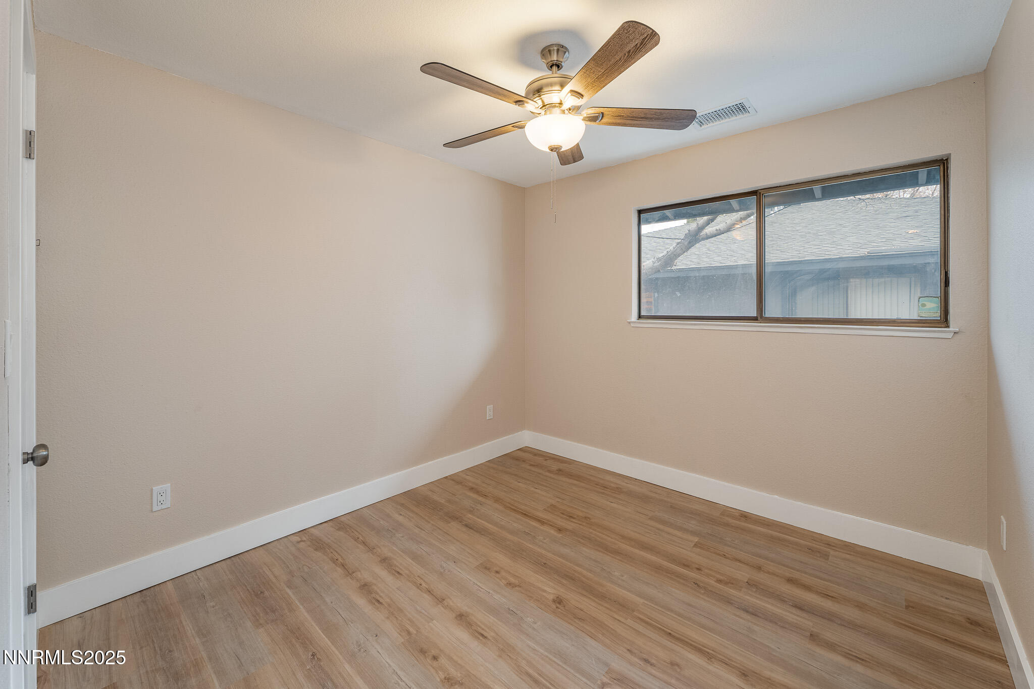 2169 Kietzke Lane, Unit B Reno, NV 89502 - Photo 15 of 20 wooden floor in an empty room