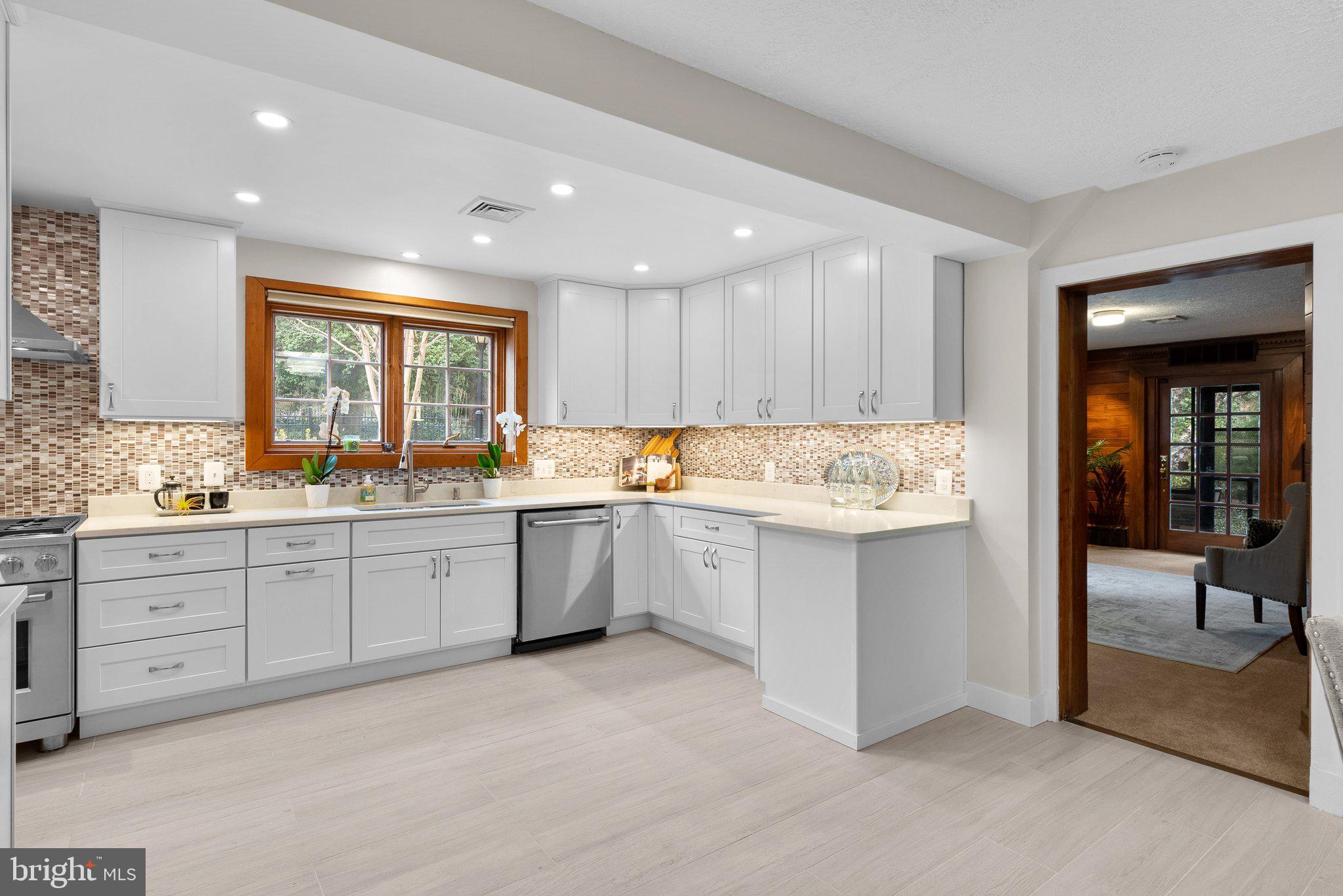 9218 Colesville Road Silver Spring, MD 20910 - Photo 25 of 76 Vast kitchen with marble counters