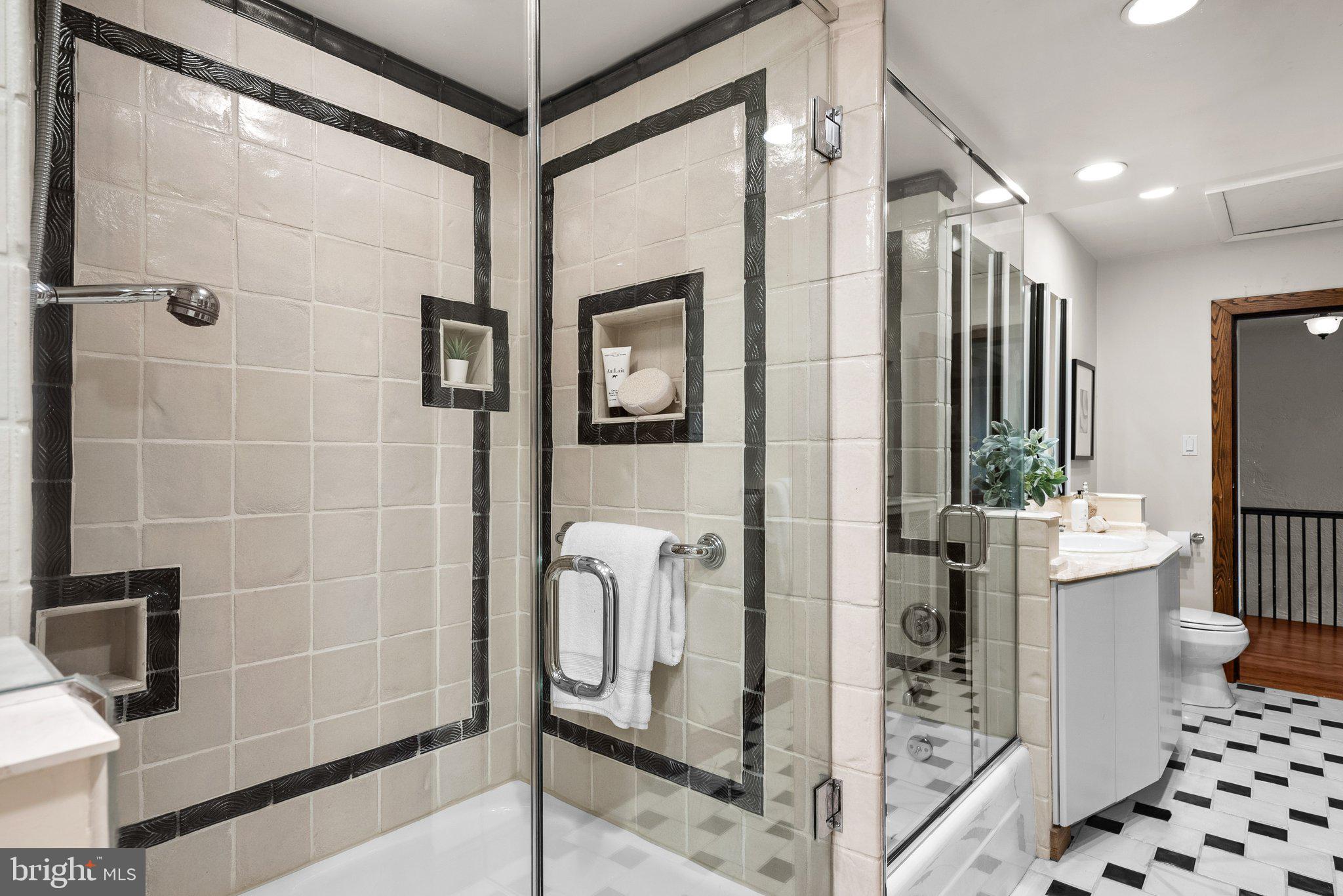 9218 Colesville Road Silver Spring, MD 20910 - Photo 33 of 76 Owner's bath/shower