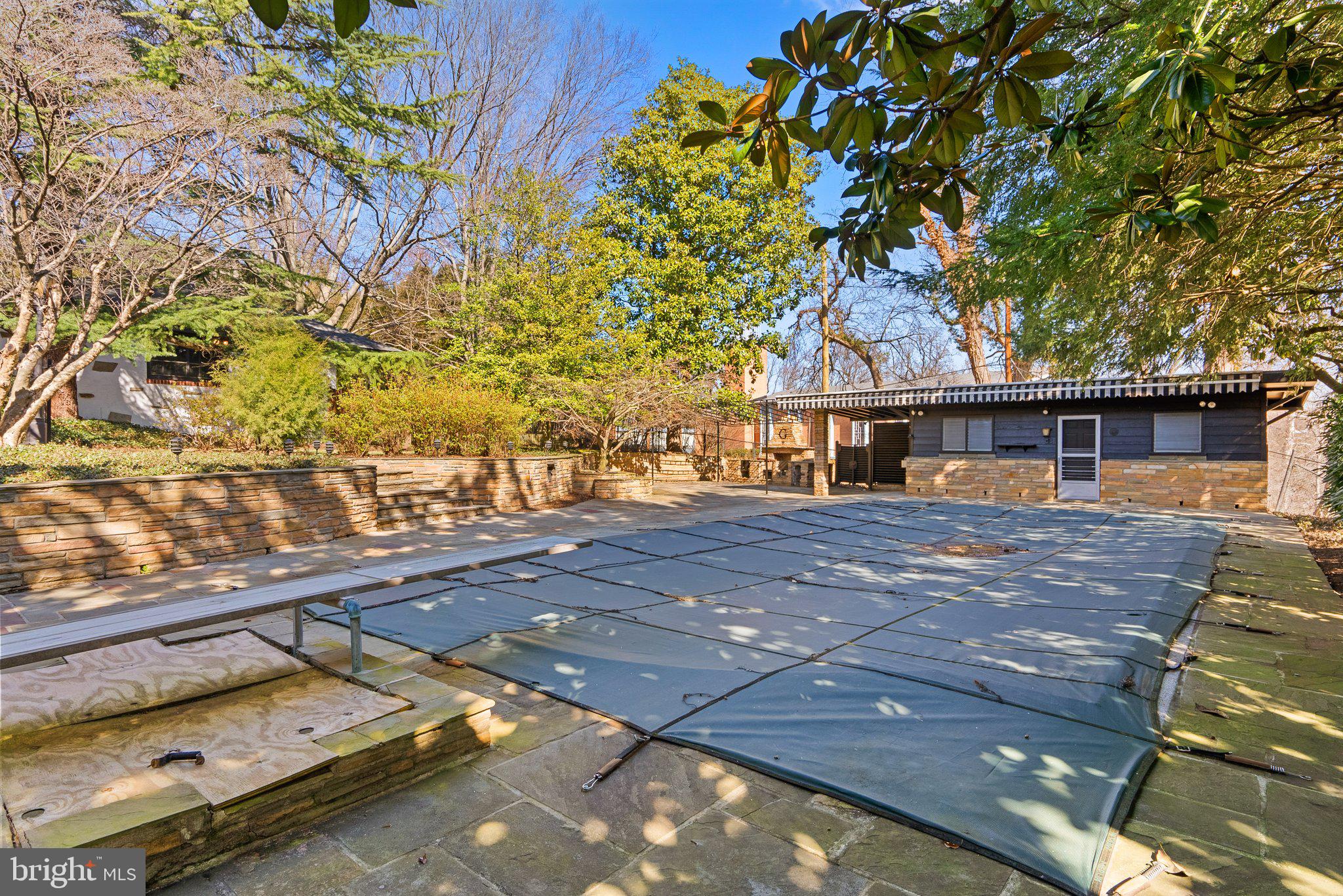 9218 Colesville Road Silver Spring, MD 20910 - Photo 50 of 76 Winter cover for the concrete pool