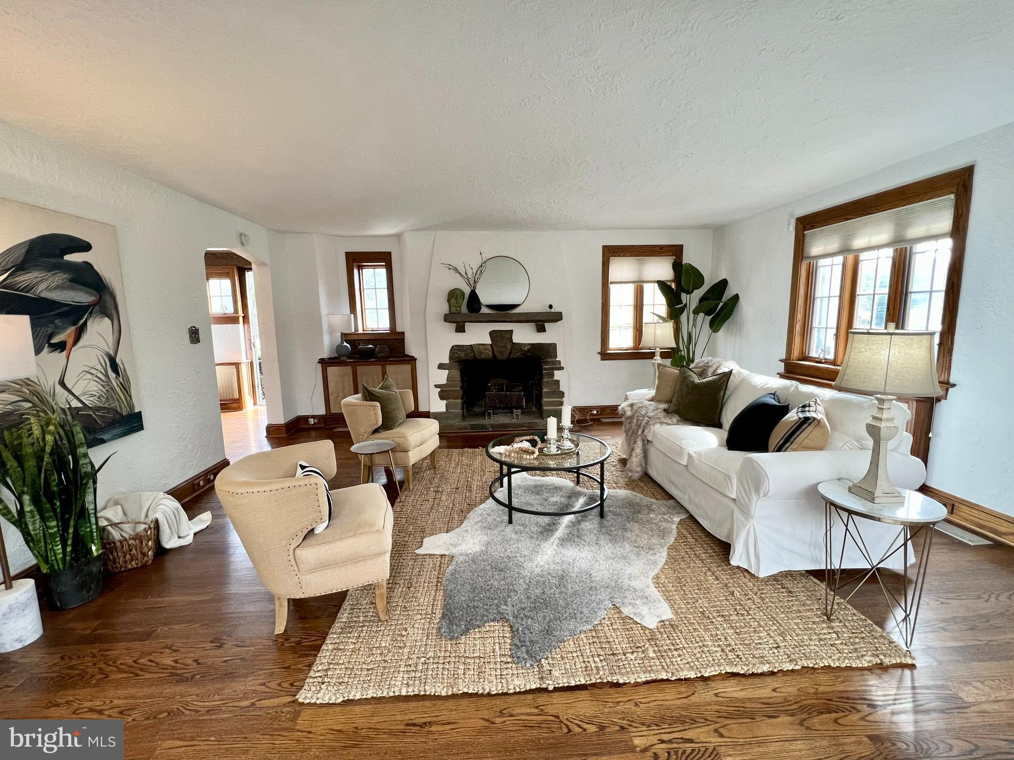 9218 Colesville Road Silver Spring, MD 20910 - Photo 5 of 76 Sundrenched living room with magnificent fireplace